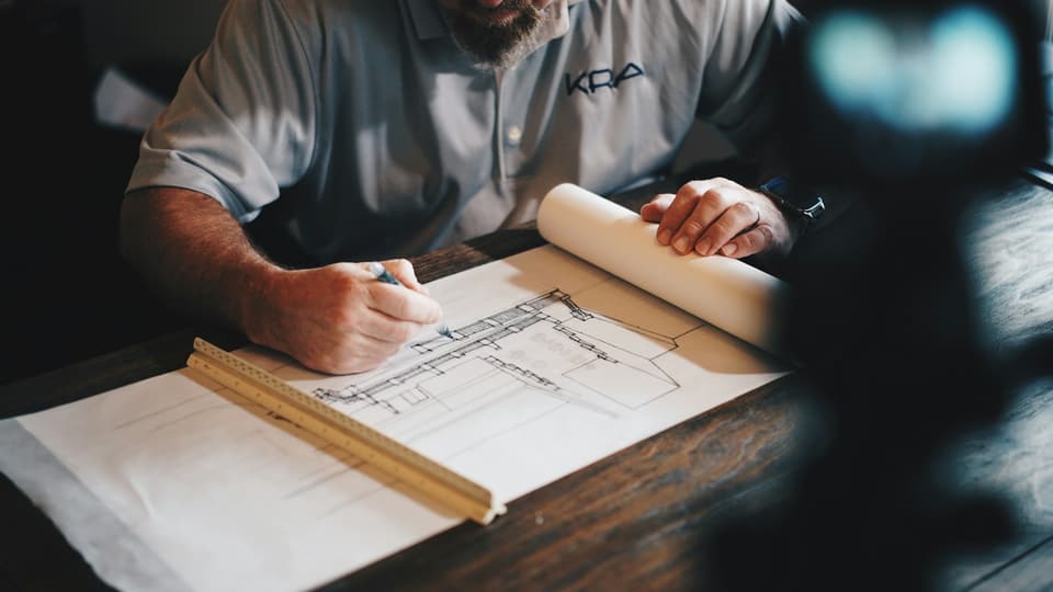 Supervisor reviewing a work log